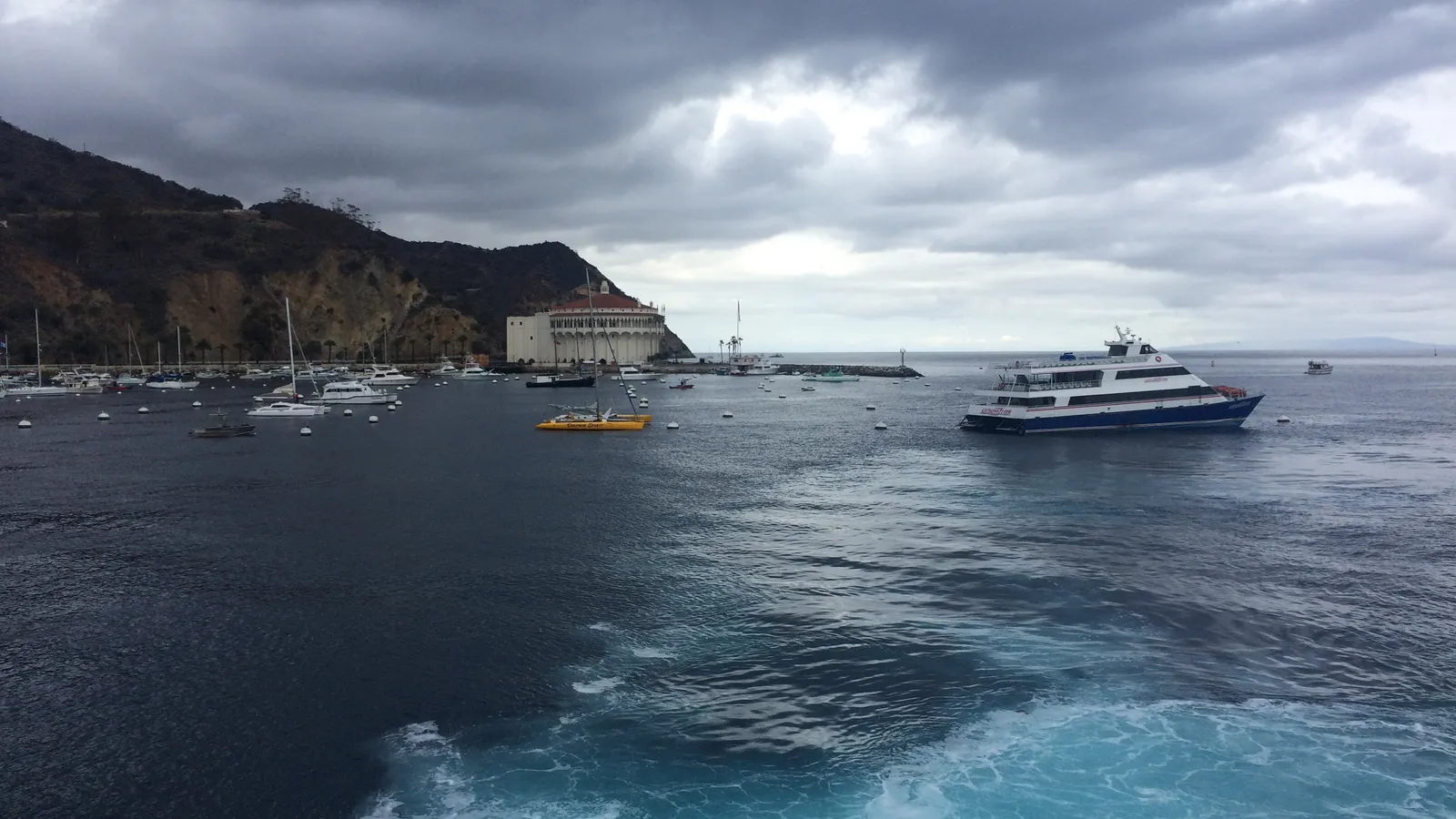 A passenger ferry and moored boats in Avalon Harbor