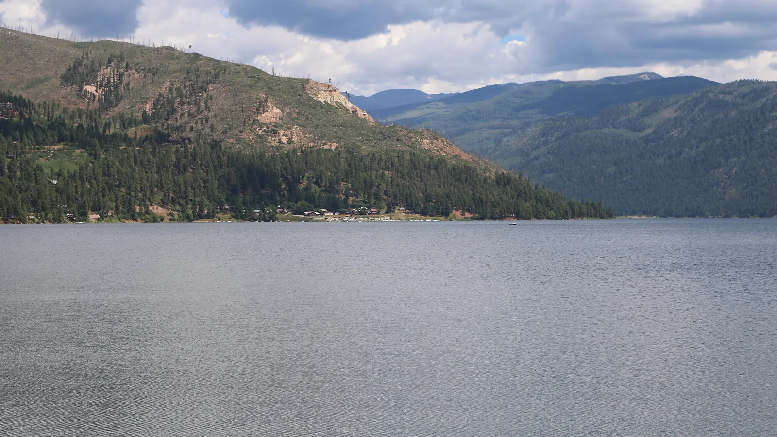 Vallecito Reservoir and its forested shoreline, seen from the dam
