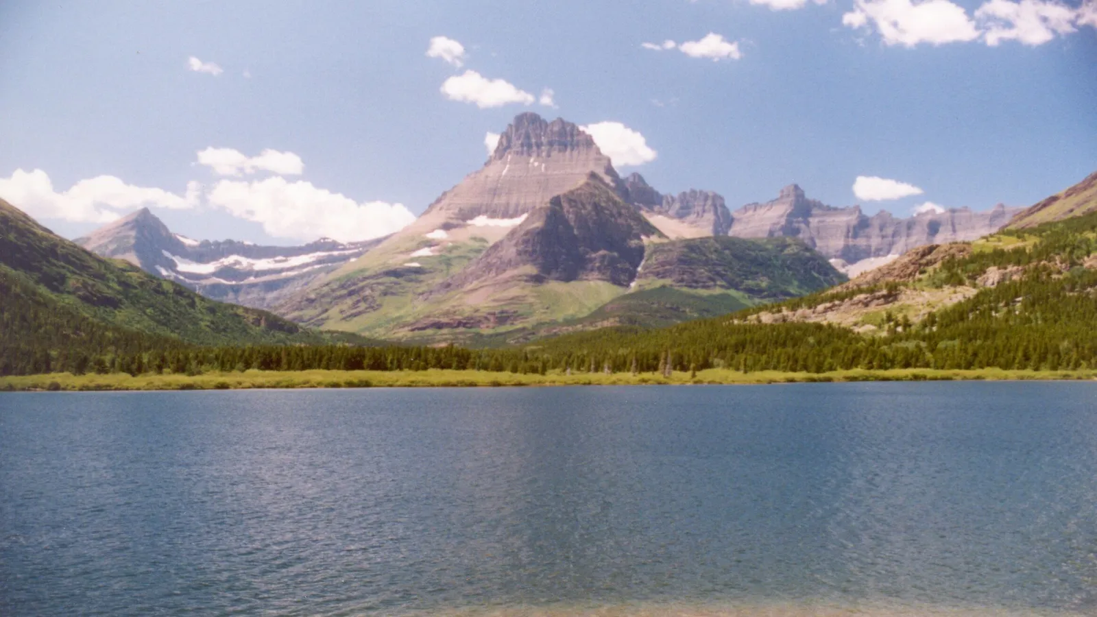 Mount Wilbur rising above Swiftcurrent Lake in the Many Glacier valley