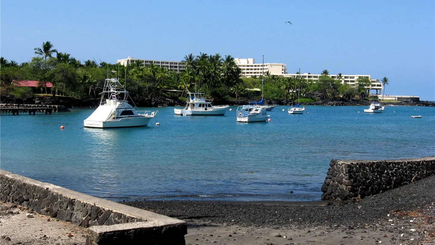 Boats moored in Keauhou Bay, seen from the boat ramp