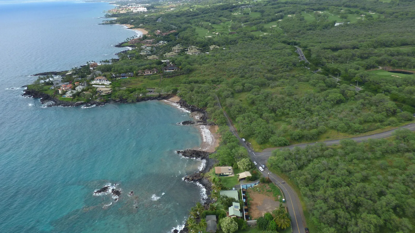 Aerial view of the small cove at Makena Landing and the rocky South Maui coastline