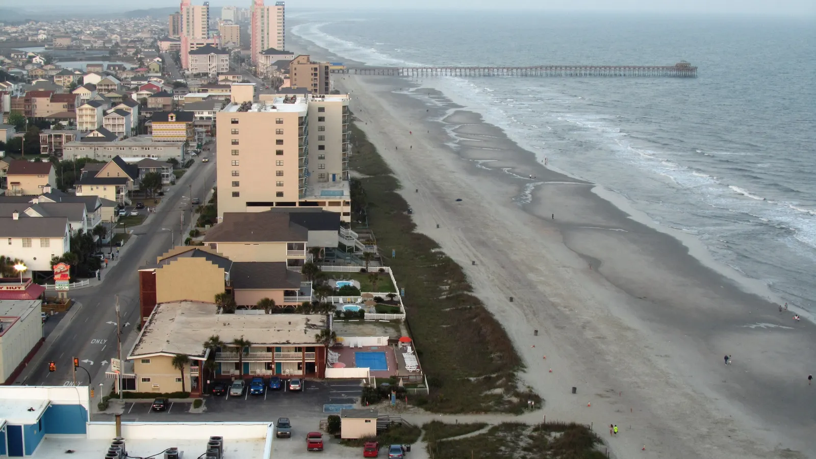 Cherry Grove Beach and pier seen from above; the marsh lies behind the beachfront