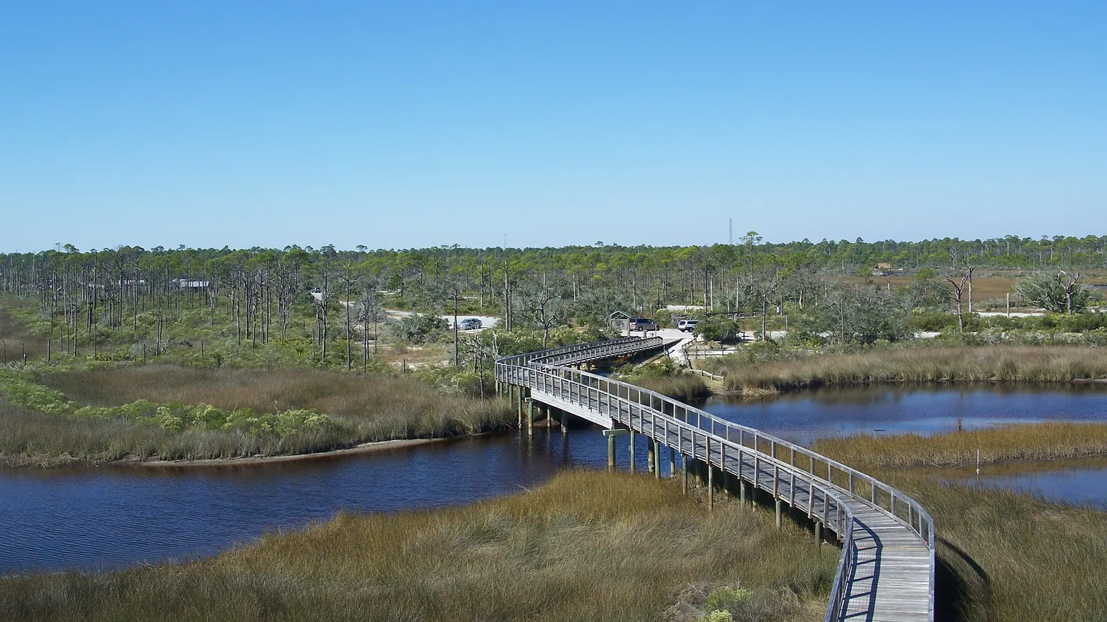 A boardwalk crossing salt marsh and a tidal creek at Big Lagoon State Park