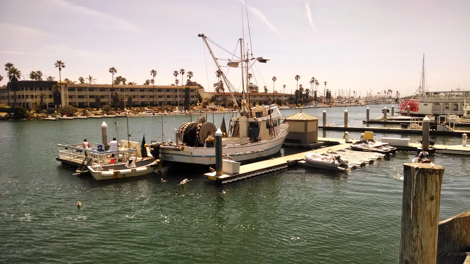 A fishing boat and floating docks in Channel Islands Harbor, Oxnard