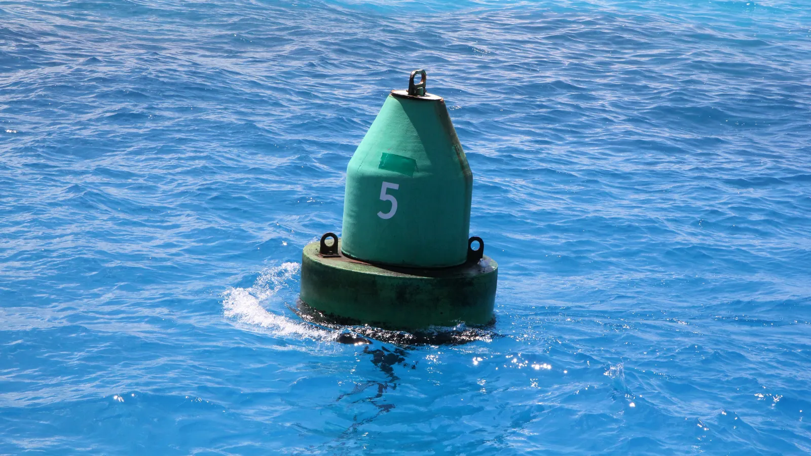 Buoy leaning with the current