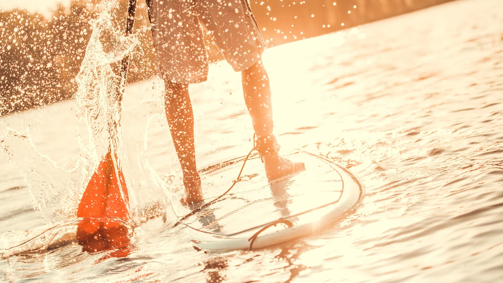 Experienced paddle boarder on a narrower board